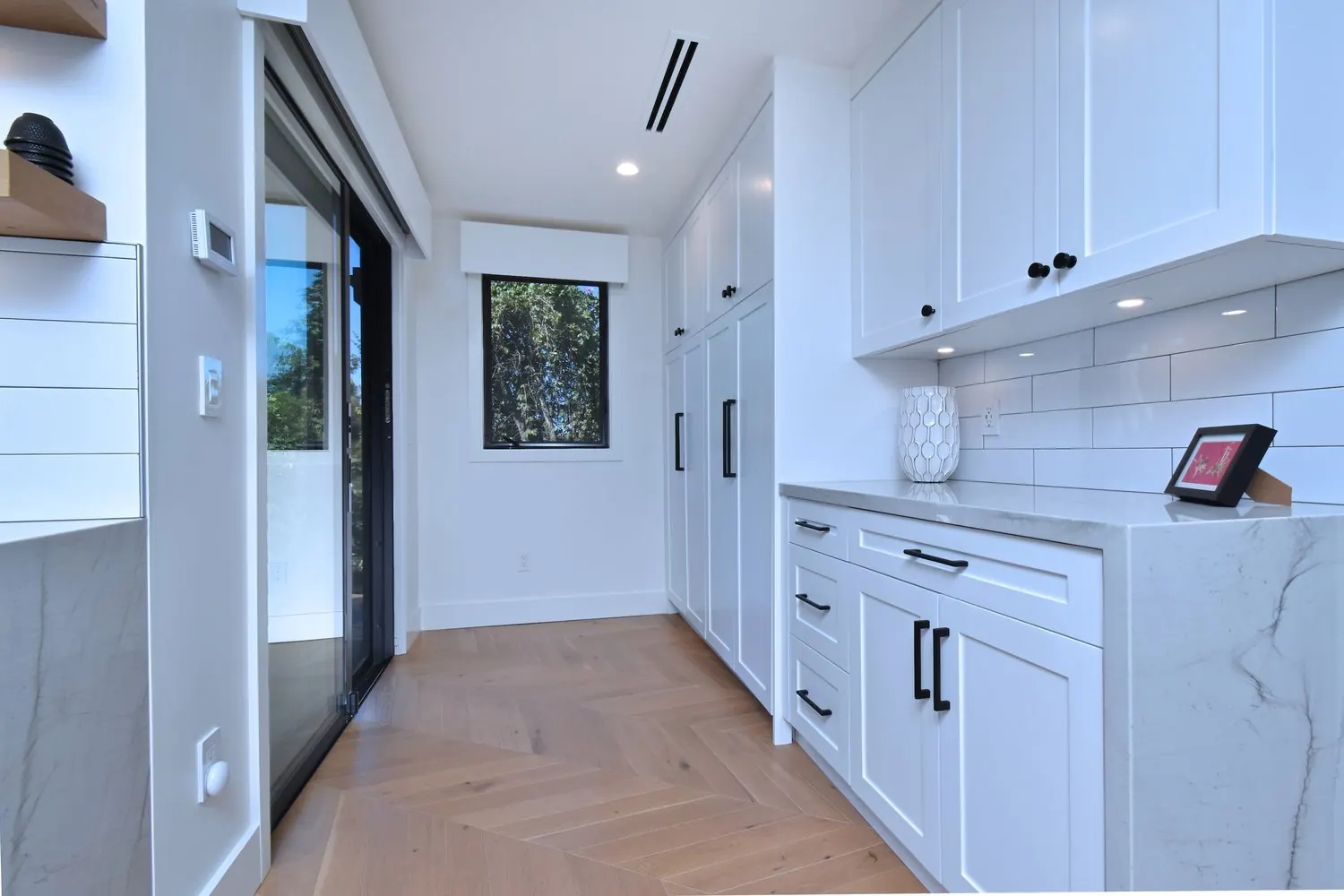 Galley kitchen and pantry in an ADU