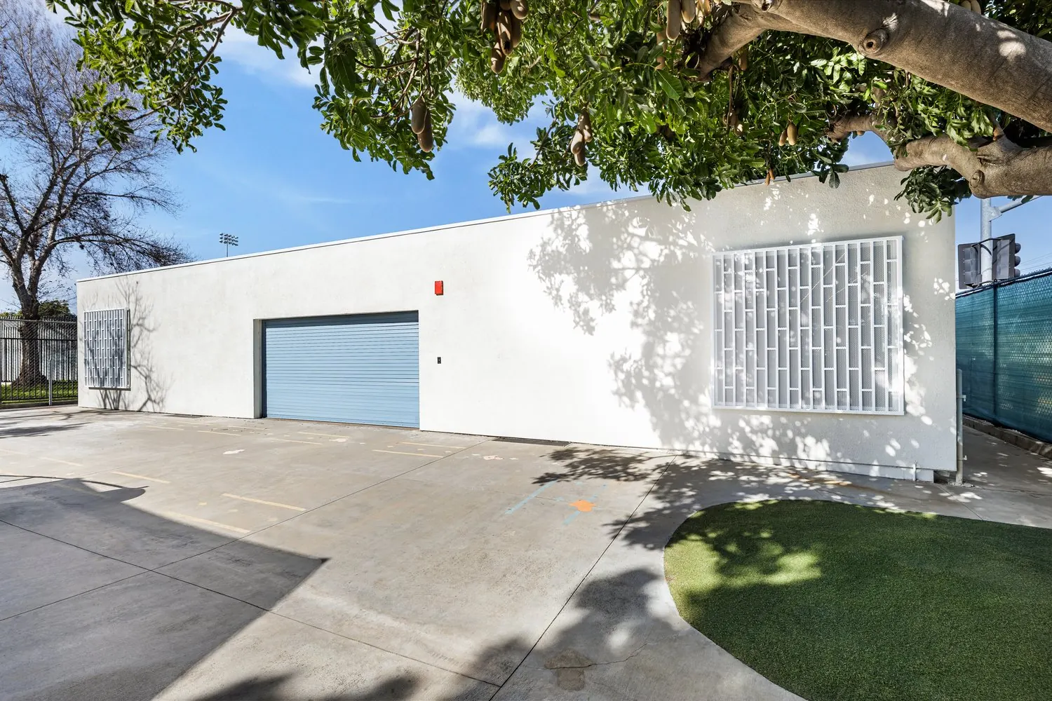 Roll-up overhead door on a finished structure