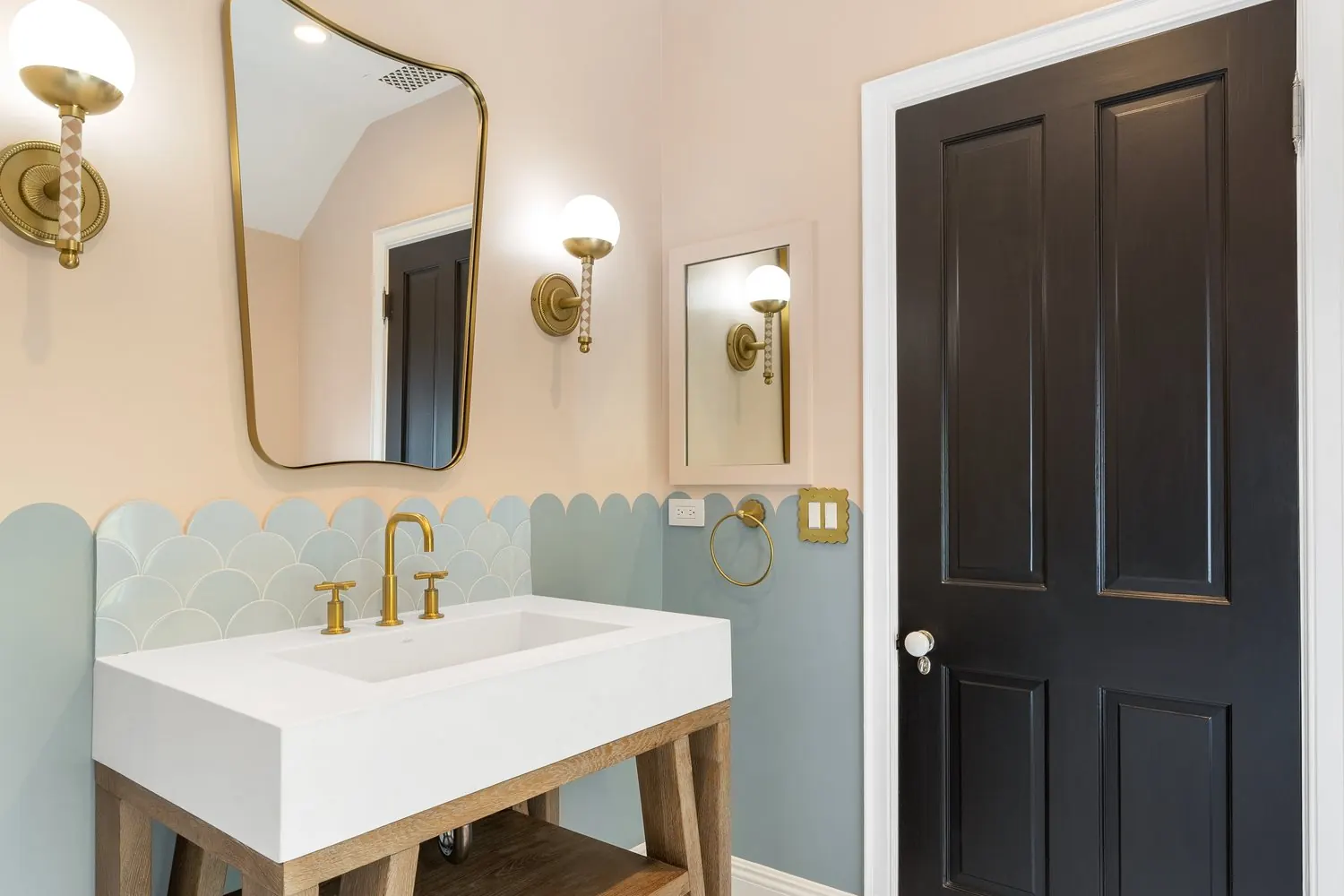 Scalloped tile and a painted bathroom door