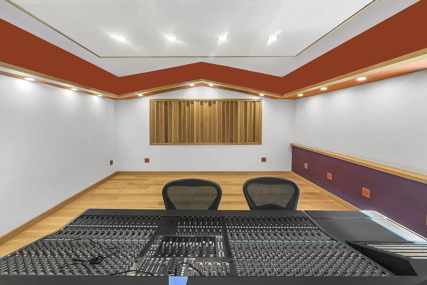 Mixing console in a recording studio control room
